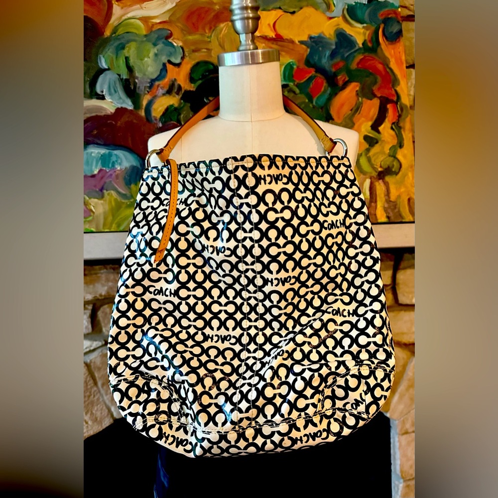 Coach logo bag in cream with black logo. Leather handle